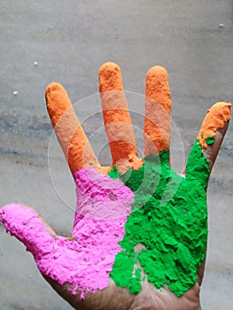 Colourful Hand during the holi festival in india