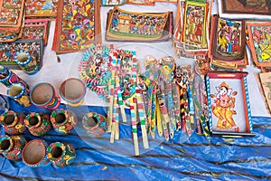 Colourful handicrafts are being prepared for sale in Pingla village.