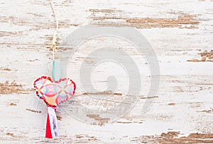 Colourful heart on retro vintage wooden background