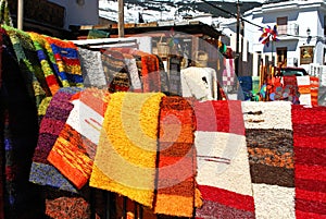 Rugs outside a shop, Capileira, Spain.