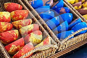 Colourful handmade soaps in baskets at the street market stall.