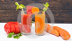 Colourful healthy carrot and tomato smoothies