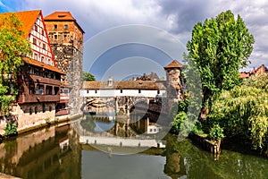 Colourful historic old town with half-timbered houses of Nuremberg. Bridges over Pegnitz river. Nurnberg, eastern