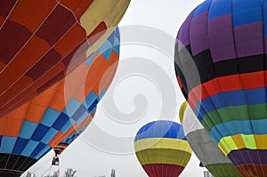 Colourful hot air balloons flying in the sky at the festival aeronautical