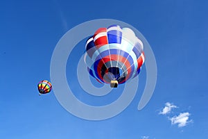 Colourful hot air balloons taking off at festival