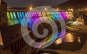 Colourful illuminated Edertalsperre at night