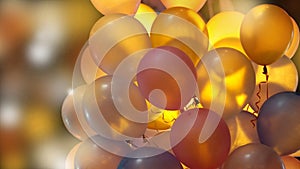 Colourful illuminated party balloons at night with back light