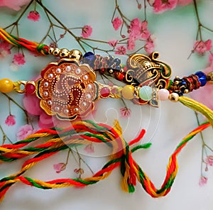 A colourful and intricately designed threads called Rakhi