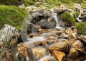 Colourful Irish mountain stream Croagh Patrick