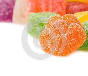 Colourful jelly candies close-up isolated on white background.