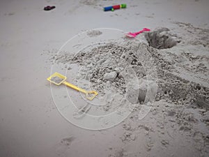 Kids toys on tropical sand beach