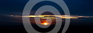 Colourful landscape of beautiful dark sunset or sunrise close to evening. Natural abstract background. Panoramic banner view