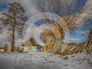 Colourful  log house winter time