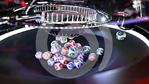 Colourful lottery balls in a lotto machine