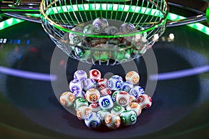 Colourful lottery balls in a machine