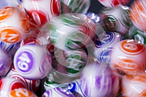 Colourful lottery balls in a machine