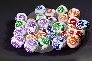 Colourful lottery balls in a sphere