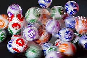 Colourful lottery balls in a sphere