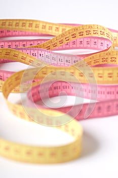 Colourful measuring tape set in waves