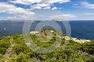 Colourful Mediterranean View of the Rugged Coastline and Eroded Rocks of Northern Sardinia With Isola Caprera, Baia Sardinia, Cost photo