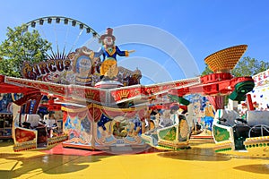 A colourful merry-go-around in the Schueberfouer, Luxembourg City photo