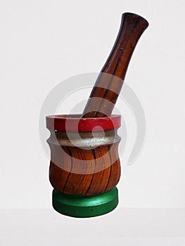 Colourful mortar pestle made up of wood.