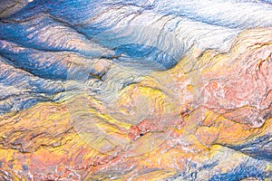 Colourful mosaics or rocks - layered sedimentary minerals