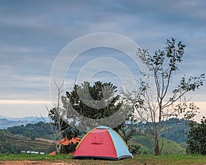 Colourful mountain tents in nature are the perfect place to relax.