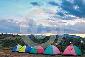 Colourful mountain tents in nature are the perfect place to relax.