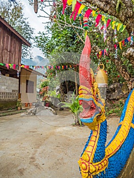Colourful Naga outside Tham Xang cave, Laos