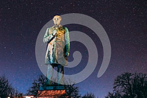 Colourful Night Starry Sky In Blue Colors. Helsinki, Finland. Close Up Of Statue Of Johan Ludvig Runeberg On Esplanadi