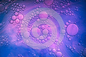 Colourful oil ink bubbles and drops. Abstract template mixed texture background. Wallpaper pattern.