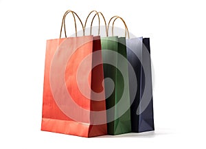 Colourful paper shopping bags on white background
