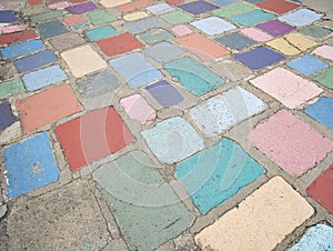 Colourful paving stones in different sizes