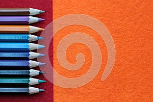 Colourful pensil with red and orange background