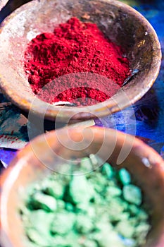 Colourful pigment powders in clay pots