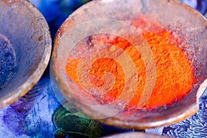 Colourful pigment powders in clay pots