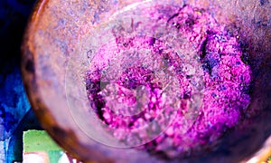 Colourful pigment powders in clay pots