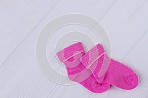 Colourful pink warm winter socks and copyspace