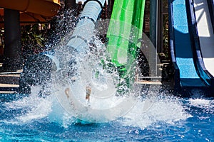 Colourful plastic slides in aquapark