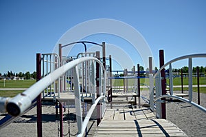 Colourful playground bridge and hand rail in school yard