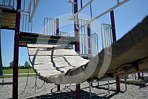 Colourful playground bridge and hand rail in school yard