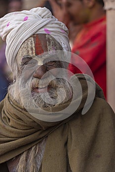 Colourful portrait of a Baba during samaj at Holi Festival at Nandgaon,UttarPradesh,India,Asia