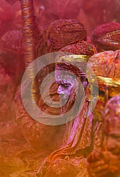 Colourful portrait of a man during Holi Festival at Nandgaon,UttarPradesh,India,Asia