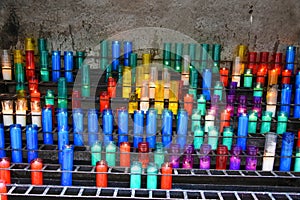 Colourful prayer candles in a church