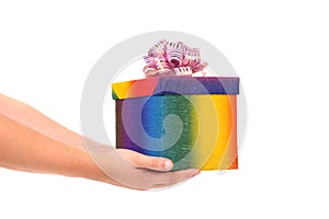 Colourful present box and pink bow.