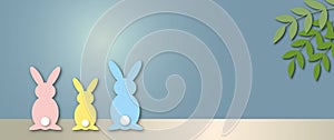 Colourful rabbit family with table, leaf and moonlight. Holiday illustration for greeting card of Happy Easterâ€™s Day.