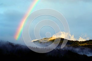 A colourful rainbow after summer rain