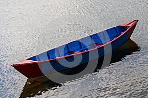 Colourful Red and Blue Canoe