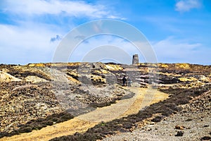 The colourful remains of the former copper mine Parys Mountain near Amlwch on the Isle of Anglesey, Wales, UK